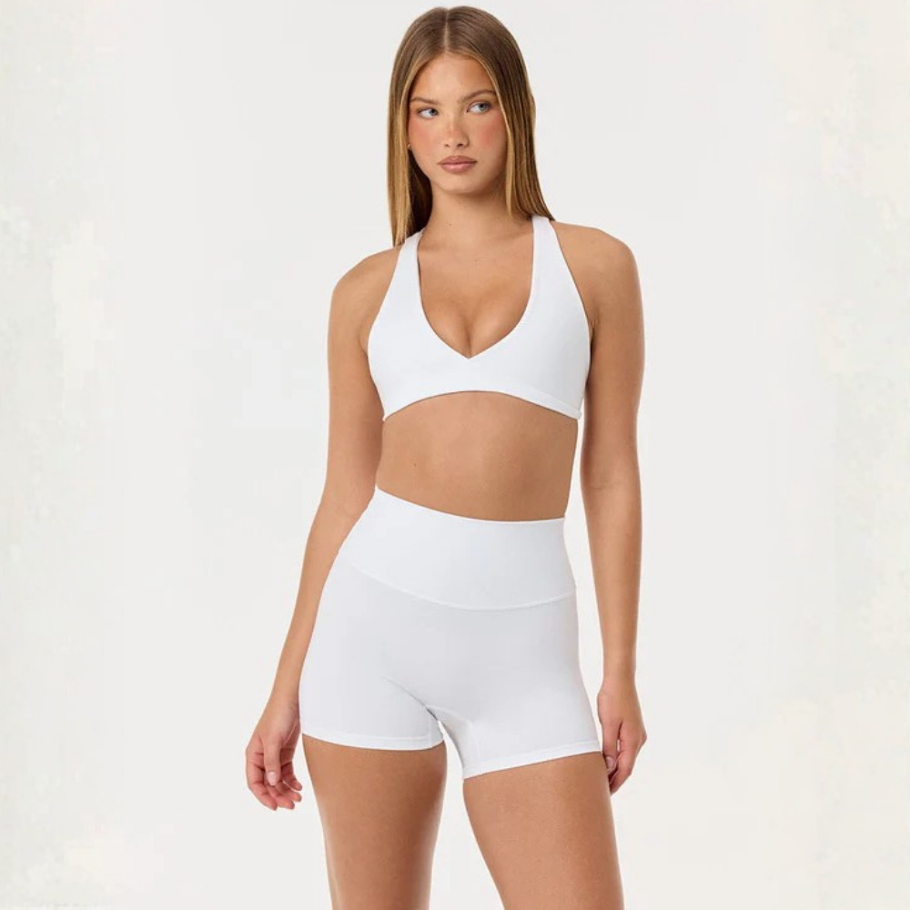 “White sports bras and crop tops – fresh, supportive activewear for women – Hot Deal Warehouse fitness”