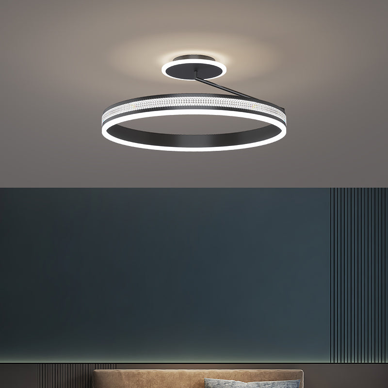 Modern minimalist bedroom with soft-glow ceiling light and clean interior design

