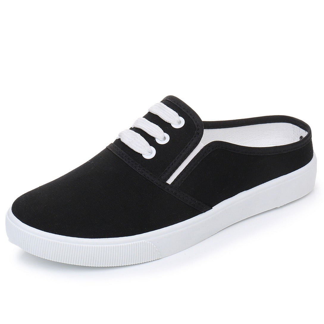 Comfortable slip-on canvas shoes for women with a flat sole, breathable upper, and versatile style, perfect for casual outings.








