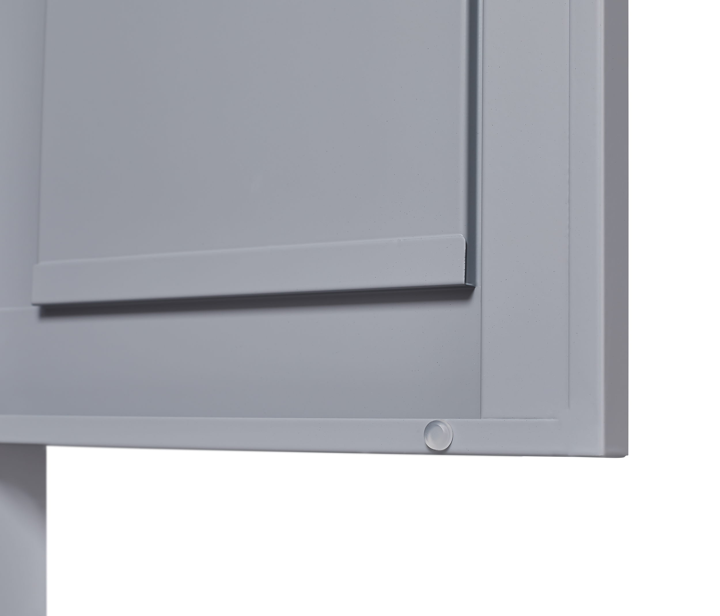 Grey metal kitchen storage cabinet with door and adjustable shelf in a modern kitchen