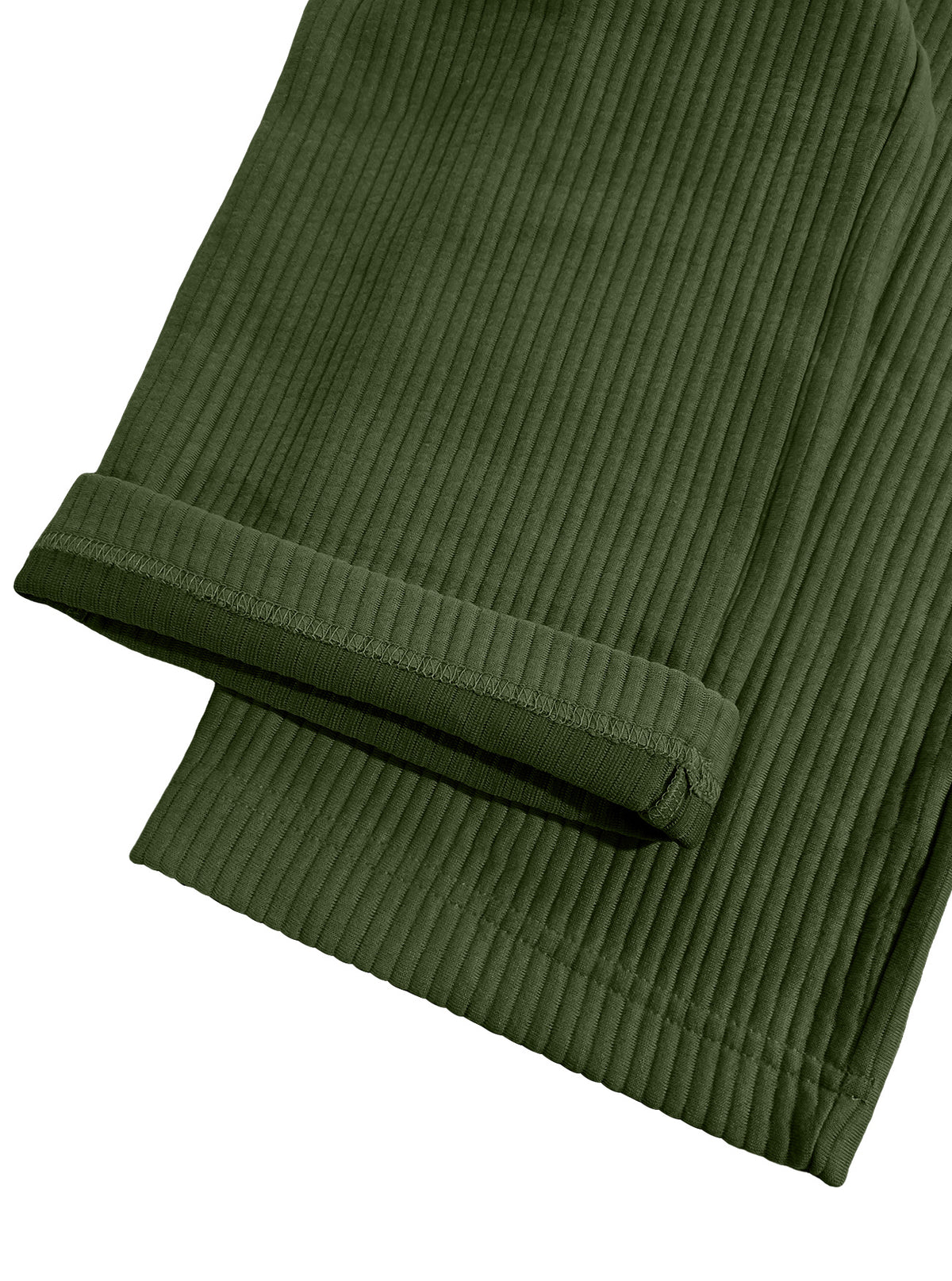 Close-up of olive green ribbed fabric, likely a pair of pants or pajamas, folded to show the corduroy-like texture against a white background.