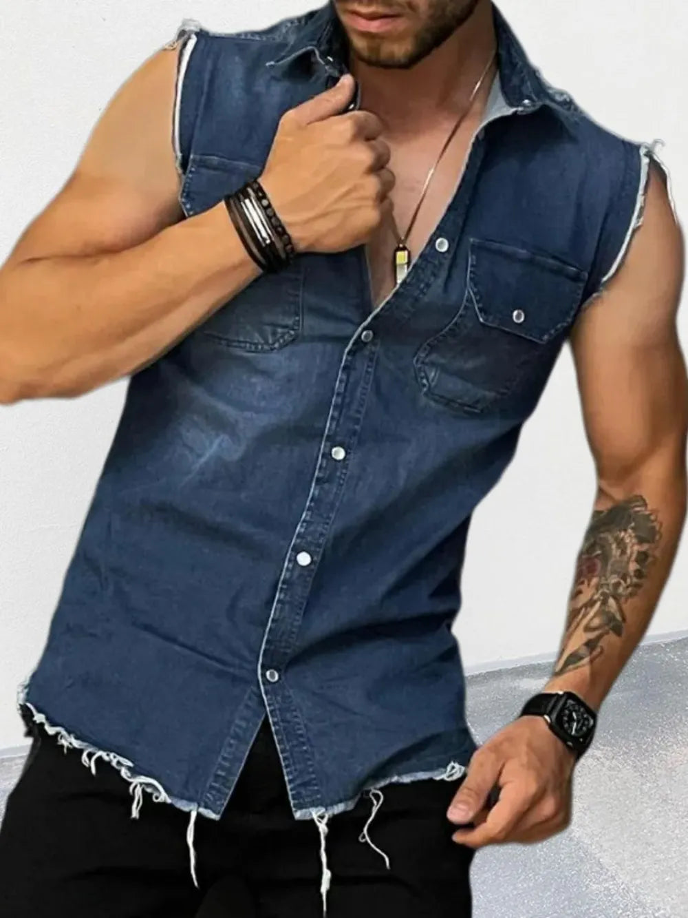 Men's snap button sleeveless denim shirt – Western style casual shirt with chest pockets and frayed armholes.








