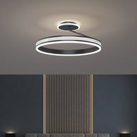Modern minimalist bedroom with soft-glow ceiling light and clean interior design

