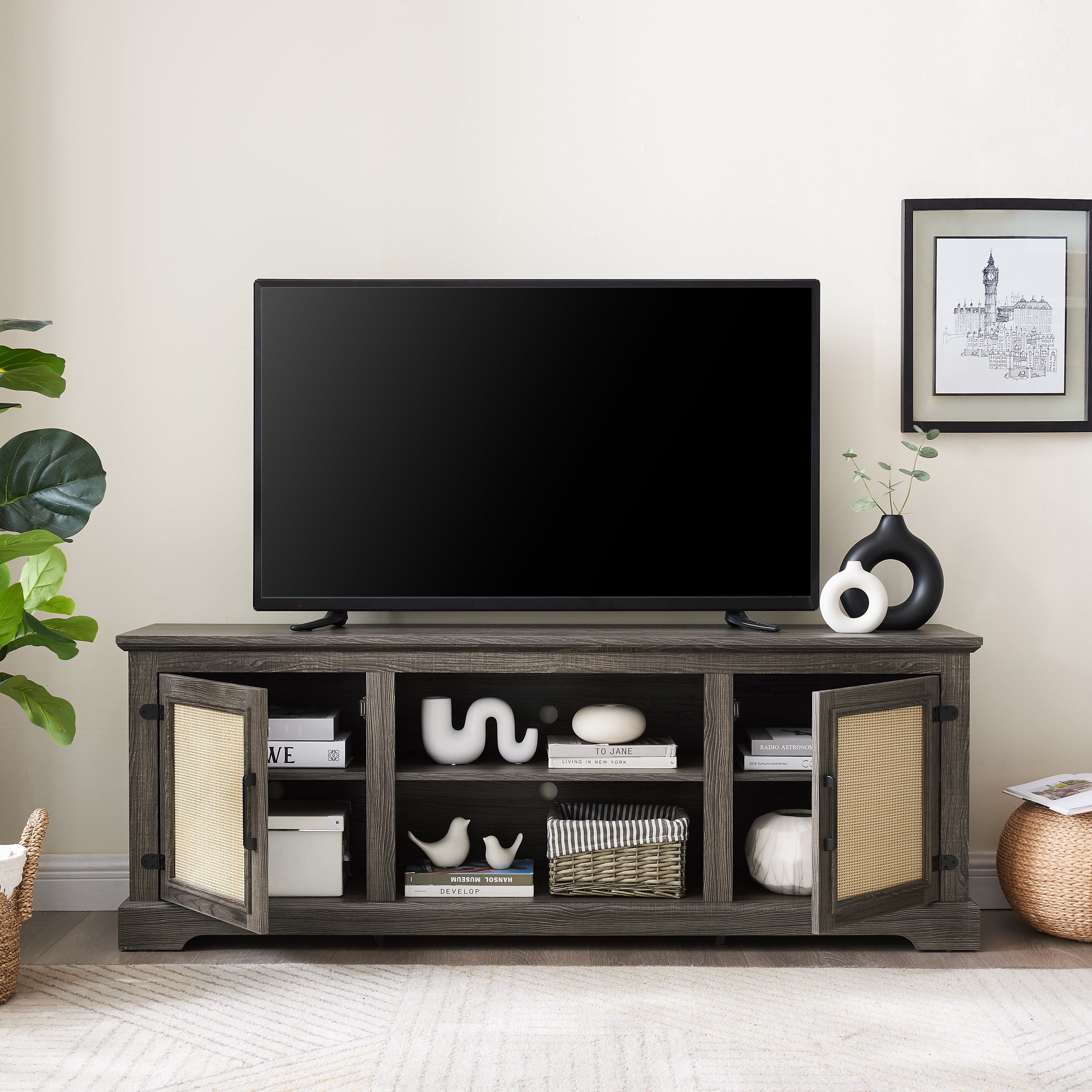 Gray TV stand with rattan doors and shelves for storage