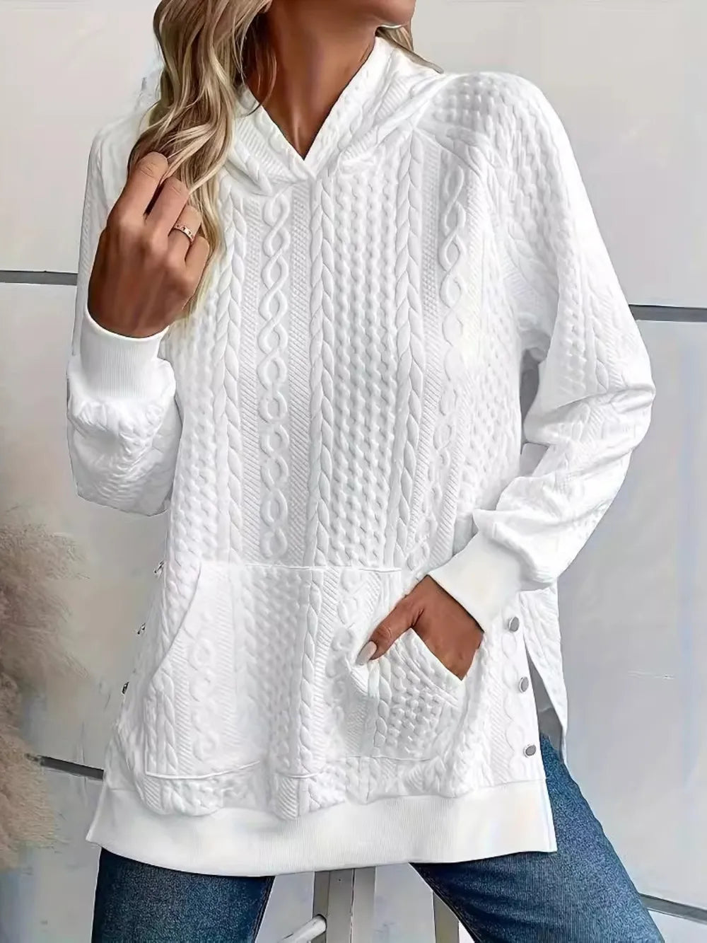 Women's oversized solid color hoodie with long sleeves, front view

