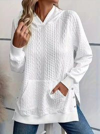 Women's oversized solid color hoodie with long sleeves, front view

