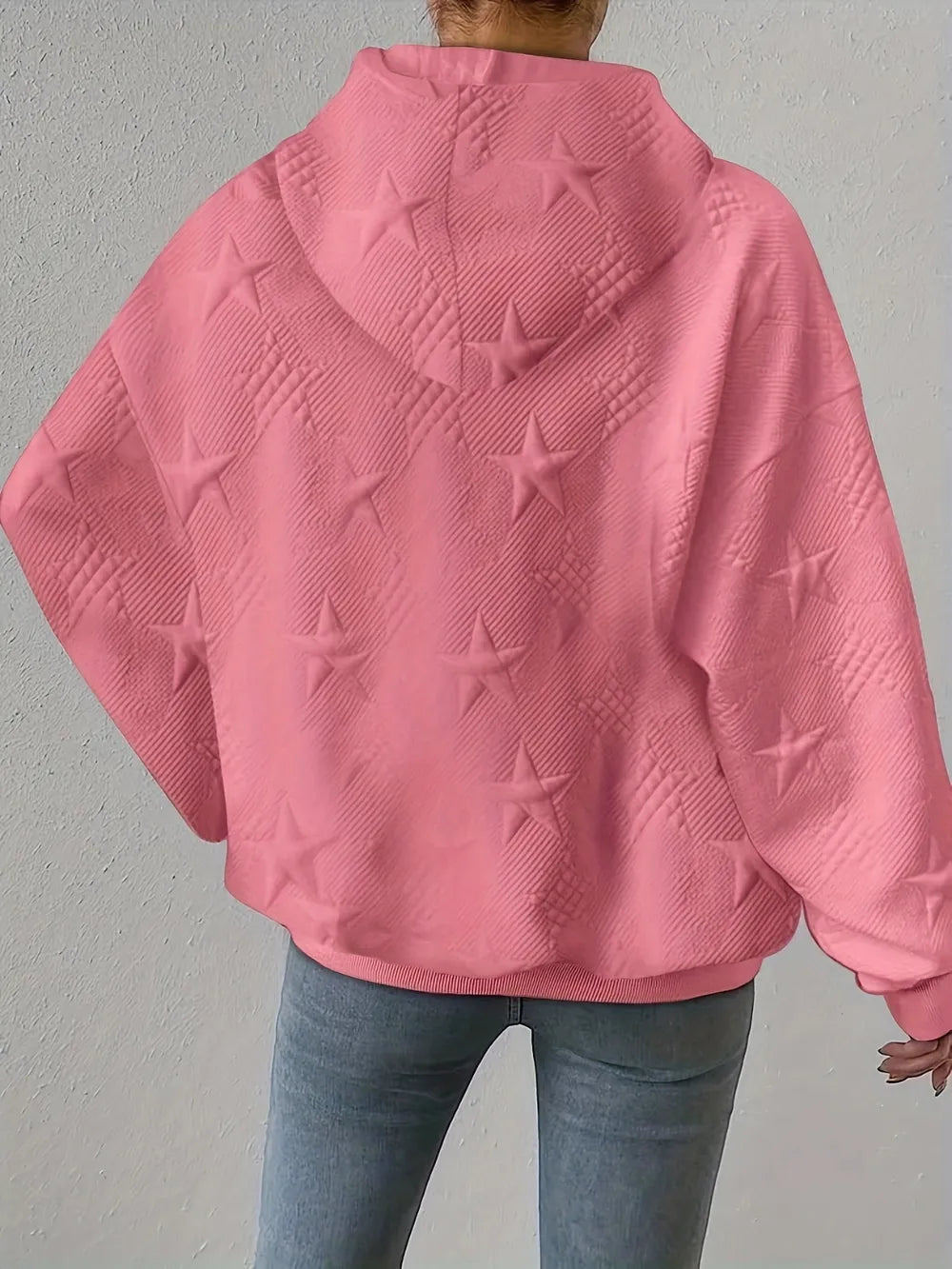 White women’s casual pullover hoodie with star texture and drawstring hood.








