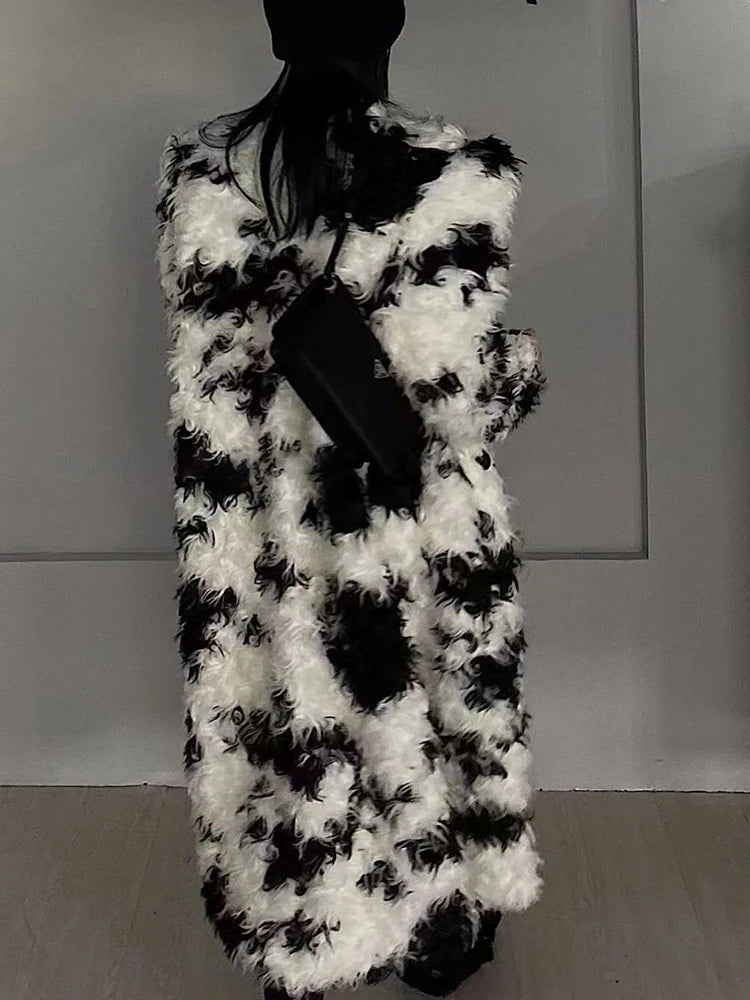 Model wearing the Temperament O-neck lambswool fur coat with contrast color design


