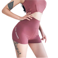 Women’s quick-dry running shorts made from moisture-wicking fabric, featuring an elastic waistband and lightweight design for comfort and performance during runs.