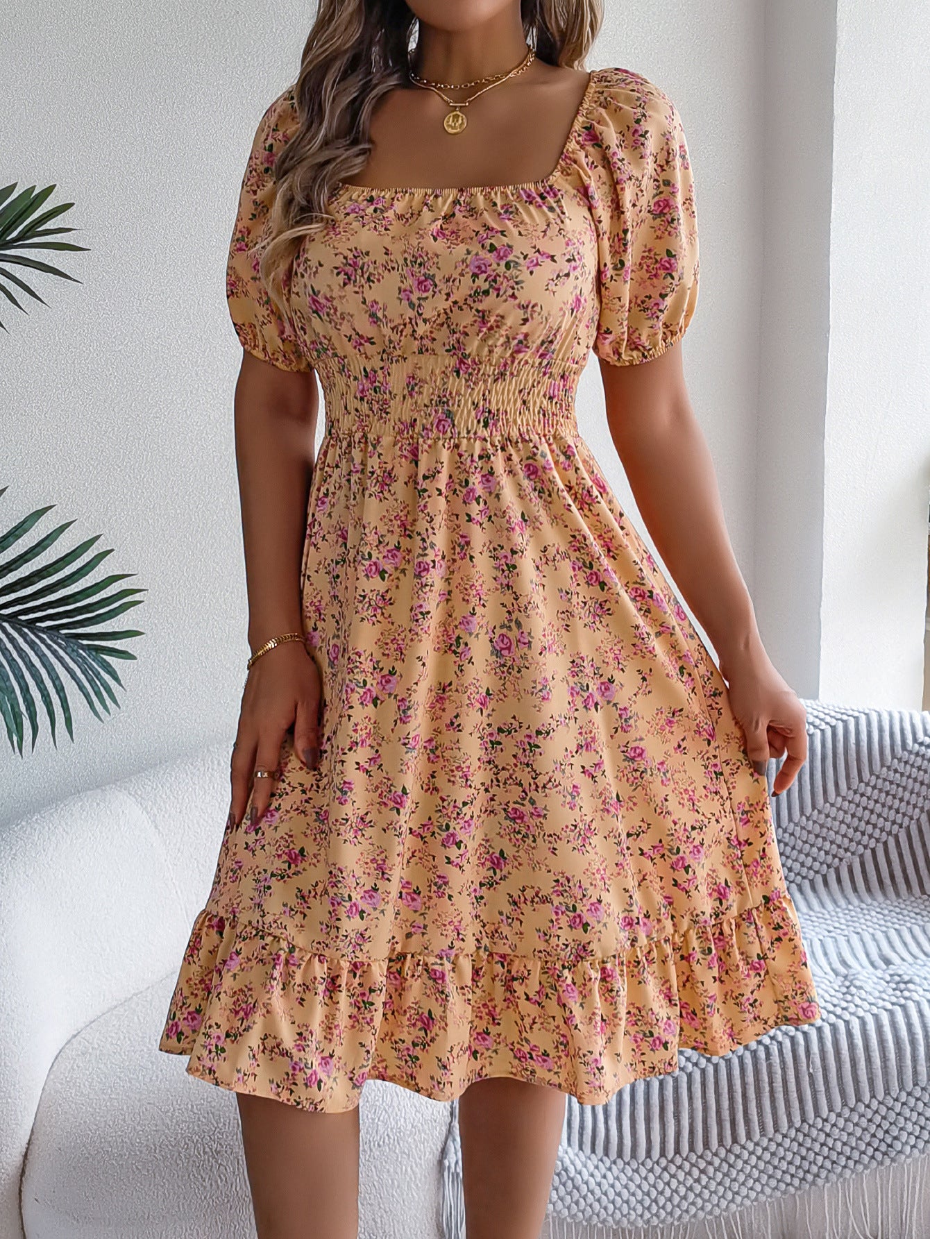 Women's floral print square collar dress with ruffle details, perfect for summer fashion and casual outings.

