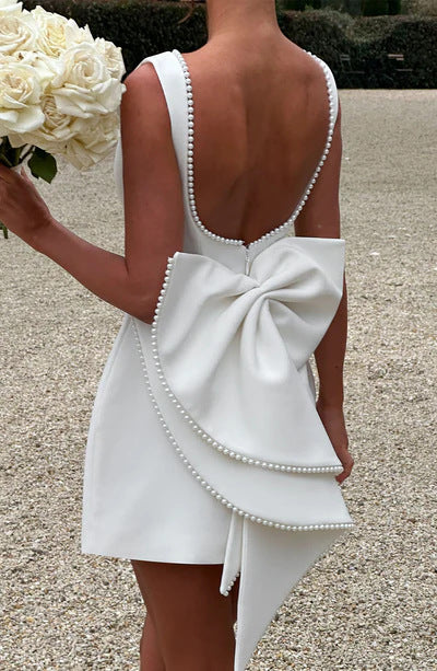 Elegant big-bowed pearls backless dress, sleeveless A-line party evening dress for women, perfect for summer soirées and formal occasions.

