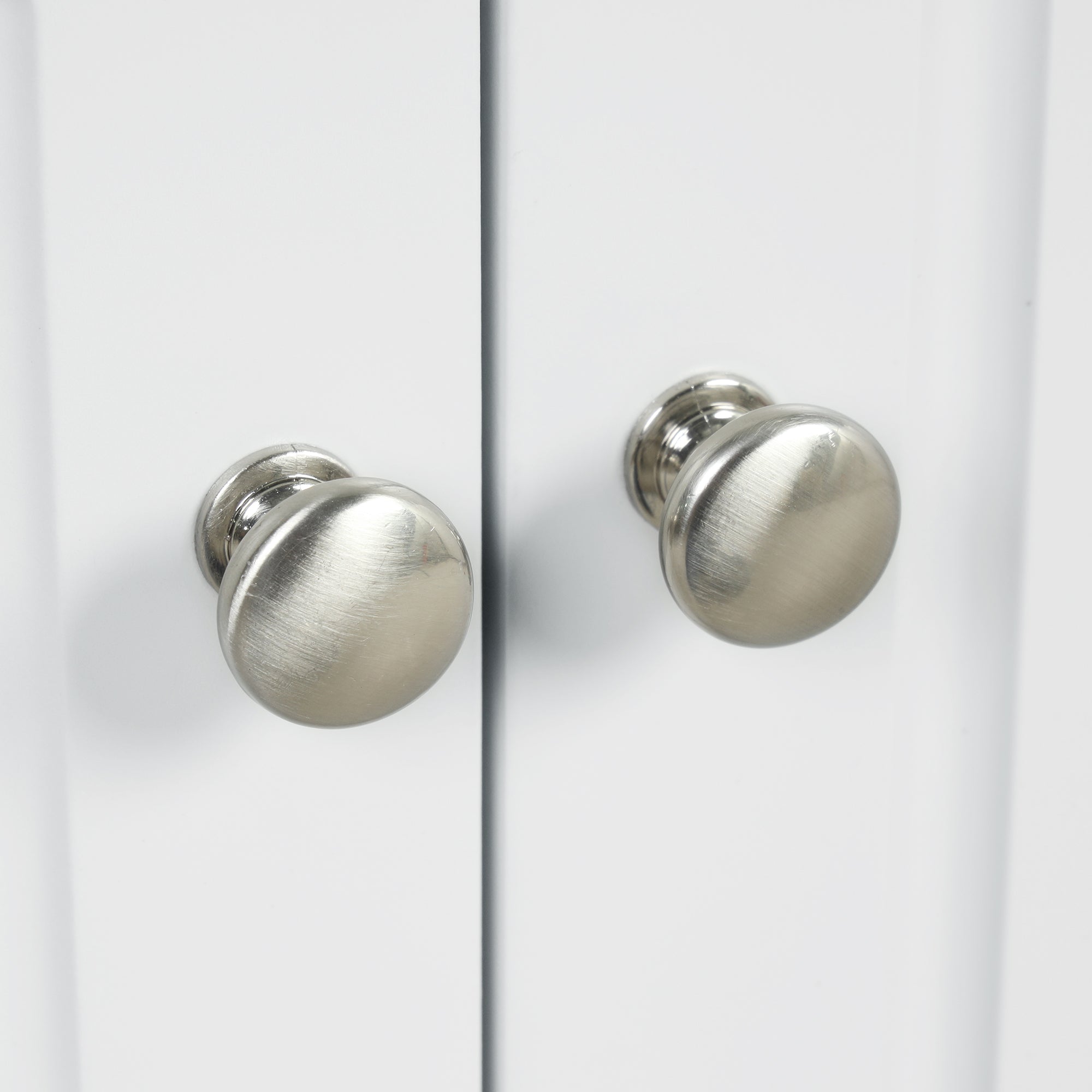 White triangle bathroom storage cabinet with a compact, space-saving design, featuring multiple shelves for organizing toiletries, towels, and other bathroom essentials. Made from durable materials, this sleek cabinet adds a functional and stylish touch to any bathroom decor.