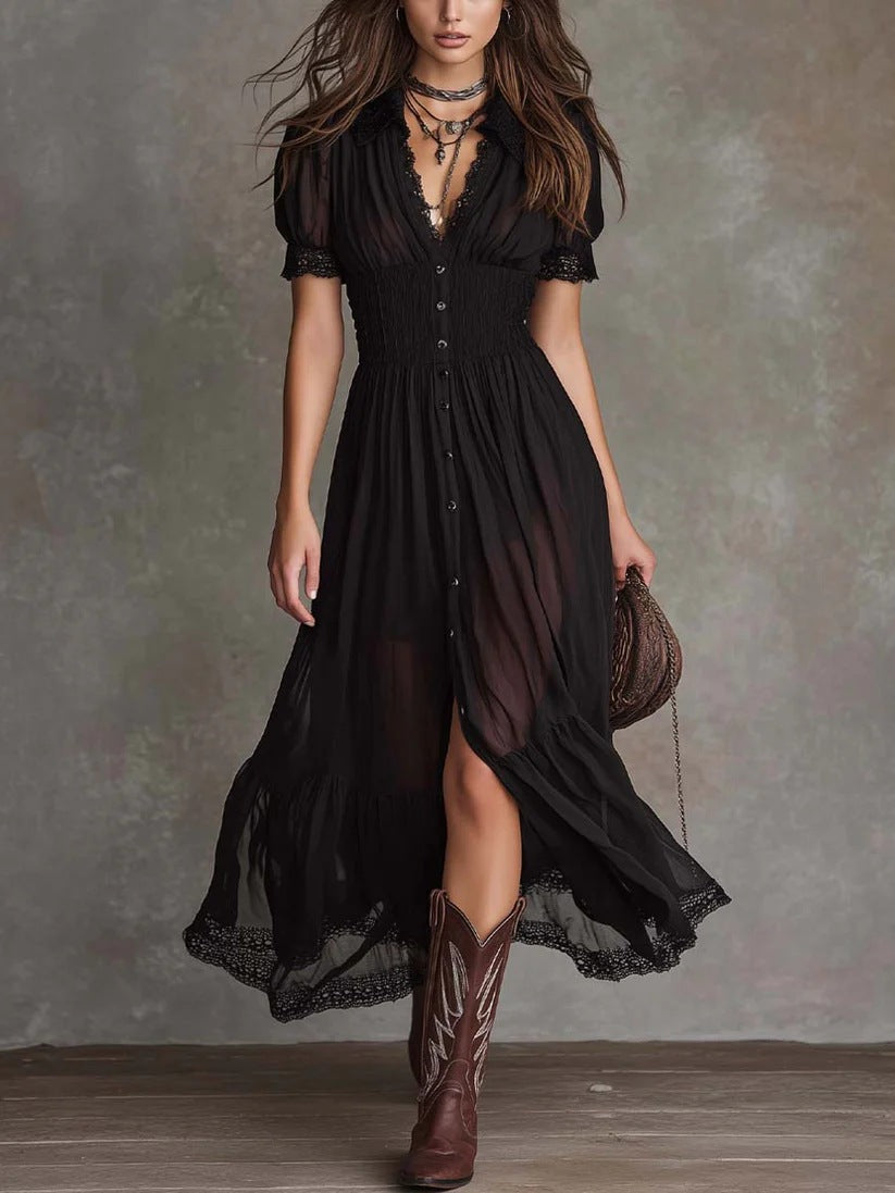 Woman wearing a black lace-trimmed maxi dress with short sleeves, layered necklaces, and brown cowboy boots