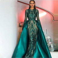 Elegant slim-fit evening dress with a luxurious fabric and refined design, ideal for formal events, galas, and red carpet moments.

