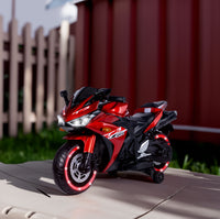 TAMCO 12V kids motorcycle ride-on toy with training wheels, designed for a fun and safe riding experience. Features realistic details, adjustable speed, and easy-to-use controls, making it perfect for young riders to enjoy outdoor adventures while learning balance and coordination.







