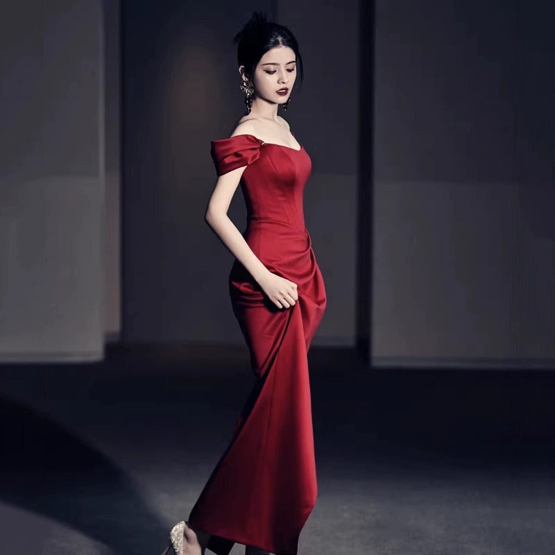 Elegant wine red engagement dress with a fashion-forward design, ideal for bridal receptions, back-to-door events, and special occasions.

