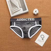 Men’s breathable ice silk mesh low waist sexy briefs in a trendy design


