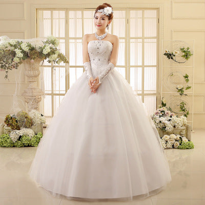Elegant Korean-style strapless tube top wedding dress with flowing fabric and minimalist design, perfect for a modern and romantic bridal look.

