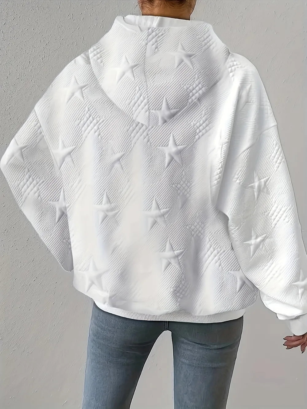 White women’s casual pullover hoodie with star texture and drawstring hood.









