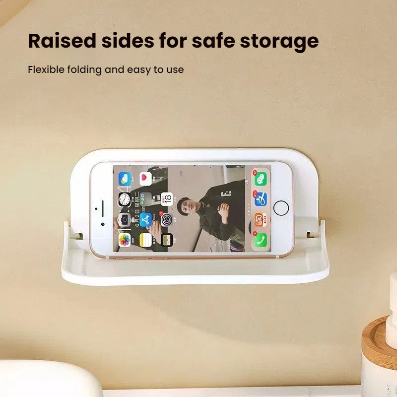 Wall-mounted plastic floating shelf in a modern bathroom holding towels