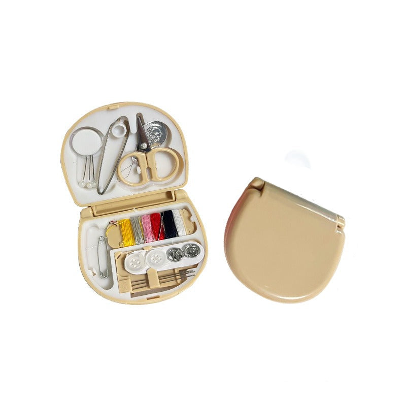 Compact mini needle box designed for organizing sewing needles, featuring multiple compartments for easy access and storage, perfect for home or travel use