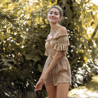 Women's off-shoulder swimsuit top, beach bikini with slubbed fabric, breathable and stylish vacation swimwear.








