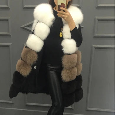 Woman wearing a colorful patchwork faux fur vest in winter setting