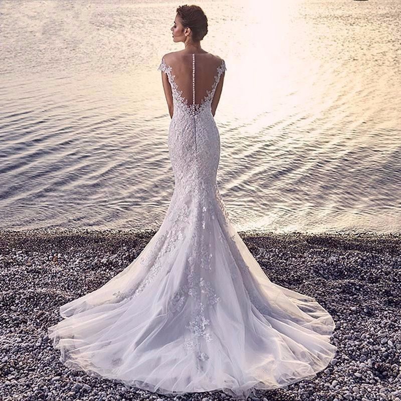 “Enchanted Mermaid Wedding Dress – magical bridal gown with mermaid silhouette and enchanting details, perfect for a fairytale wedding – Hot Deal Warehouse bridal fashion”

