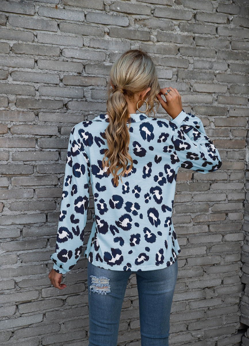 Women's long-sleeve V-neck top with a bold leopard print pattern, perfect for adding a touch of fierce fashion to your wardrobe.








