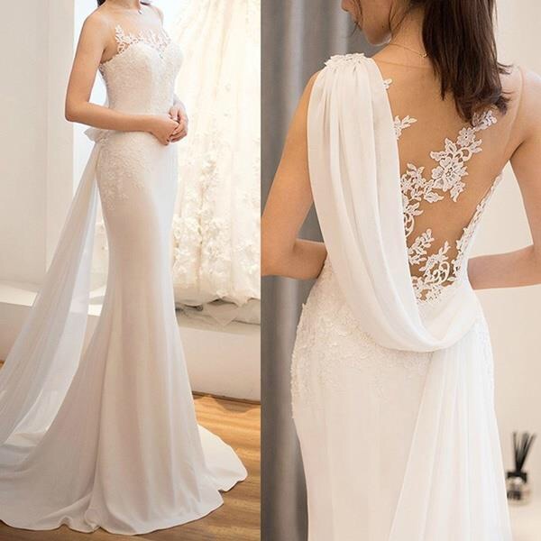 Elegant mid-waist see-through light wedding dress with a dreamy, fairy-like design, featuring delicate lace and a soft flowing silhouette.

