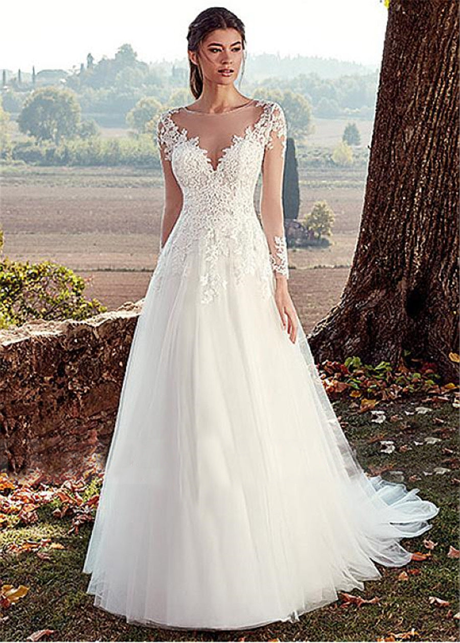 Elegant high U-neck wedding dress with lace long sleeves, a flowing A-line silhouette, and a romantic long tail for a stunning bridal appearance.

