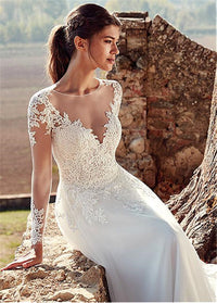 Elegant high U-neck wedding dress with lace long sleeves, a flowing A-line silhouette, and a romantic long tail for a stunning bridal appearance.

