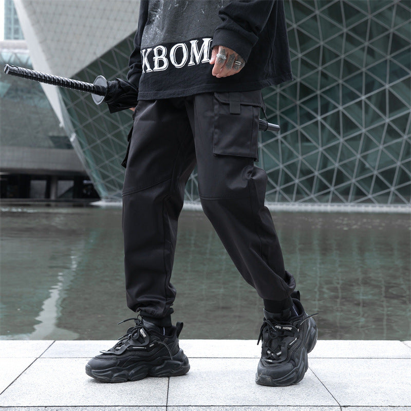 Men's Autumn Dark Overalls with loose fit, ankle-tied design, and multi-pocket storage for a stylish and practical look.