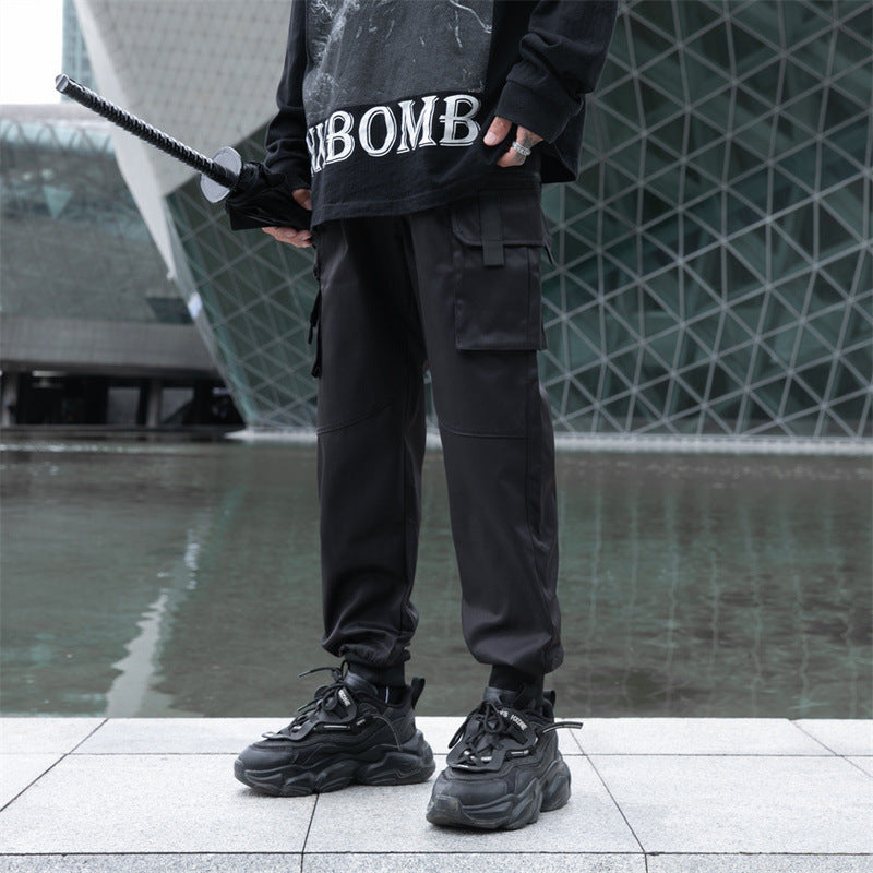 Men's Autumn Dark Overalls with loose fit, ankle-tied design, and multi-pocket storage for a stylish and practical look.