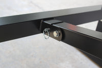 Olympic weight bench with adjustable squat rack, designed for strength training, featuring sturdy construction and multiple settings for bench press, squats, and other weightlifting exercises.