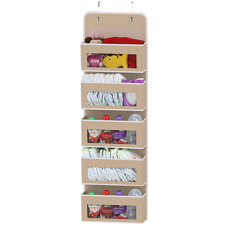 5-pocket hanging organizer on the back of a white bedroom door

