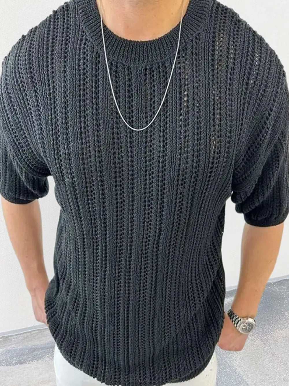 Men's openwork knit t-shirt with round neckline, front view

