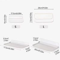 Wall-mounted plastic floating shelf in a modern bathroom holding towels