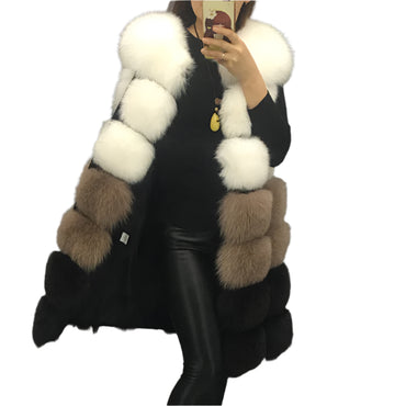 Woman wearing a colorful patchwork faux fur vest in winter setting