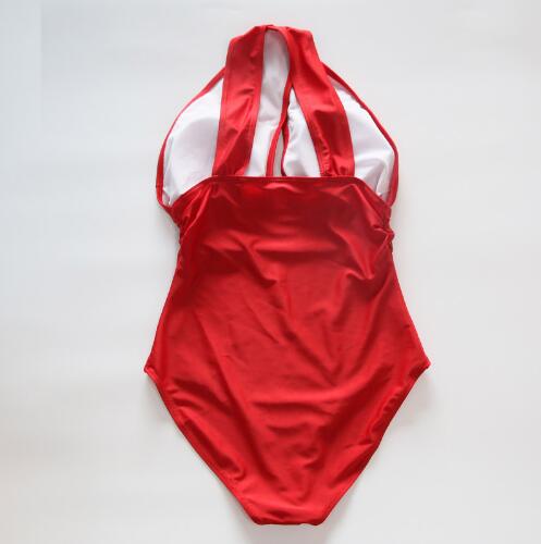 Tequila Shots cross halter swimsuit featuring a trendy and bold design with a flattering cross-back halter top. Made from high-quality, stretchy fabric for comfort and style, perfect for beach days, pool parties, and sunny vacations.