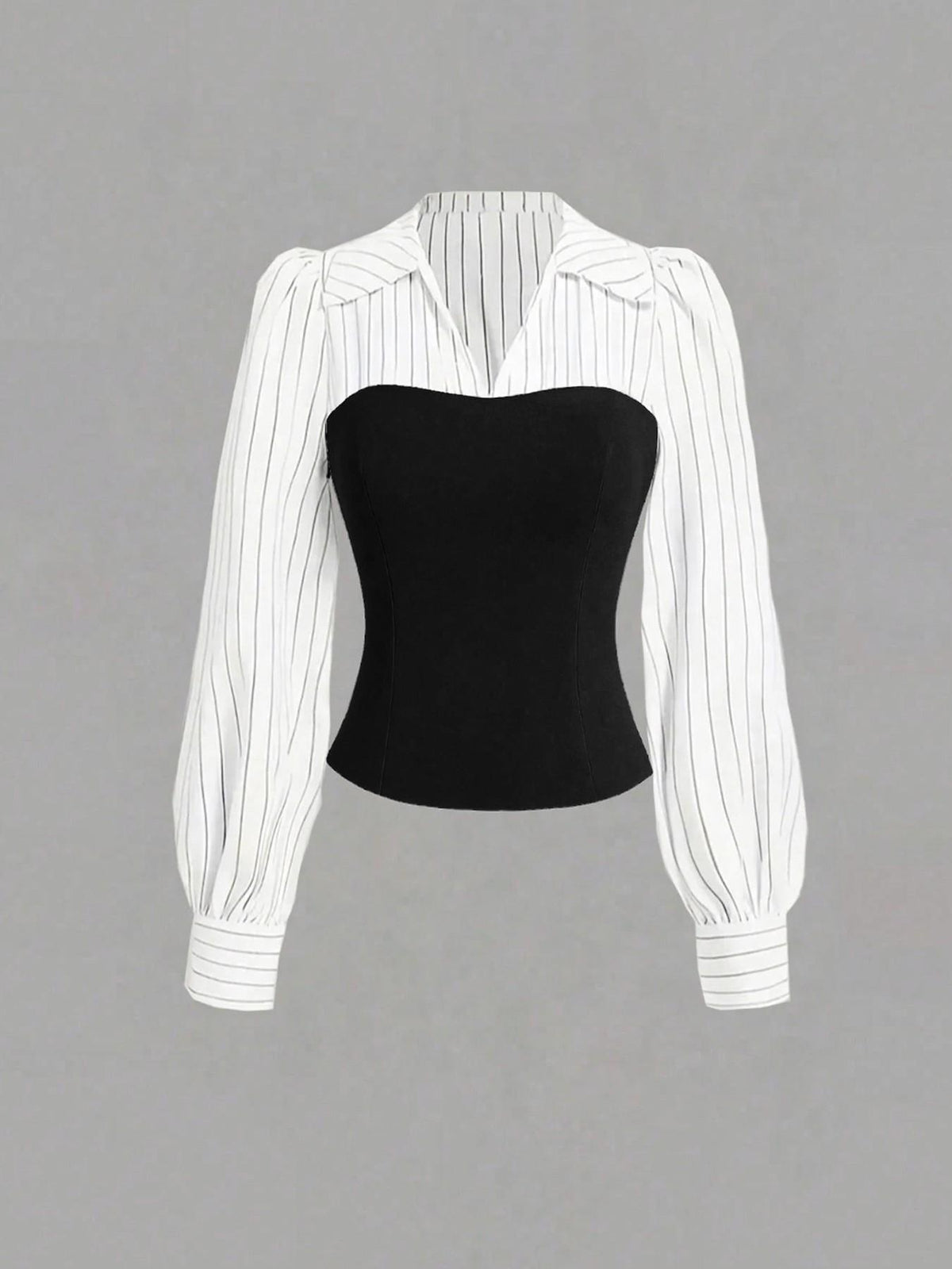 Black strapless top with a white pinstripe blouse on a gray background