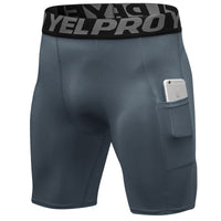 Men’s black PRO gym shorts with built-in compression tights, side pockets, and sweat-wicking fabric

