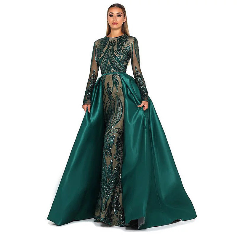 Elegant slim-fit evening dress with a luxurious fabric and refined design, ideal for formal events, galas, and red carpet moments.

