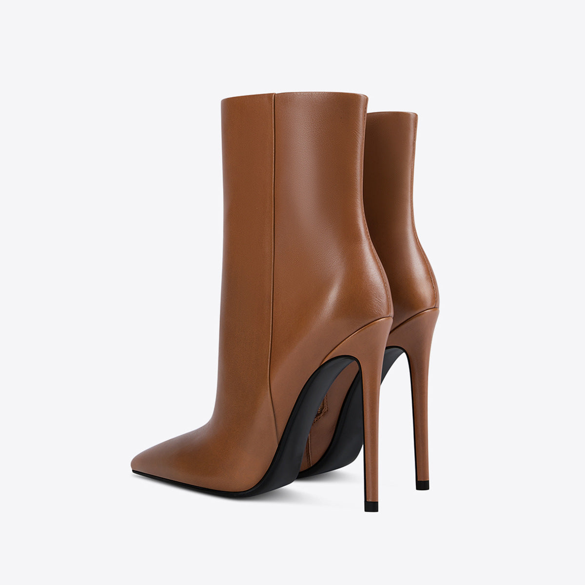 European and American Pointed-Toe Stiletto Ankle Boots – Chic and elegant ankle boots with a pointed toe and stiletto heel for a sophisticated look.








