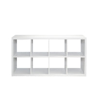 White 8-cube organizer shelf used in a modern home office