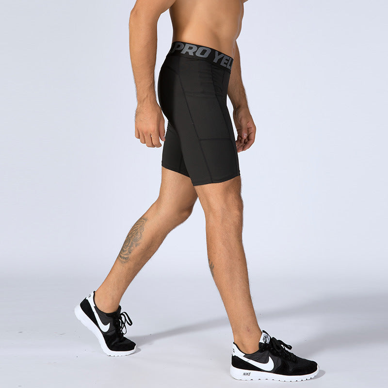 Men’s black PRO gym shorts with built-in compression tights, side pockets, and sweat-wicking fabric

