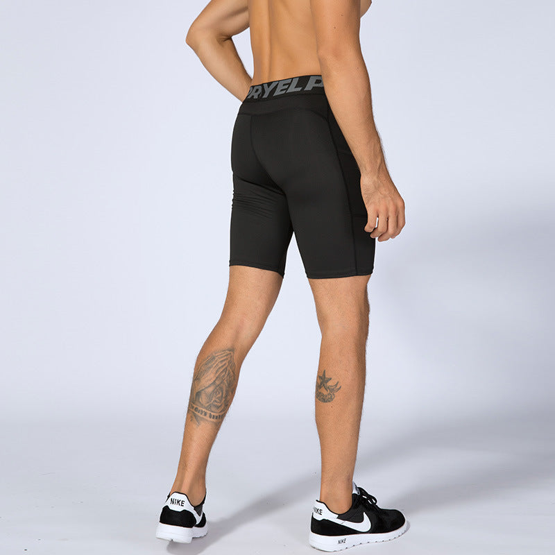 Men’s black PRO gym shorts with built-in compression tights, side pockets, and sweat-wicking fabric

