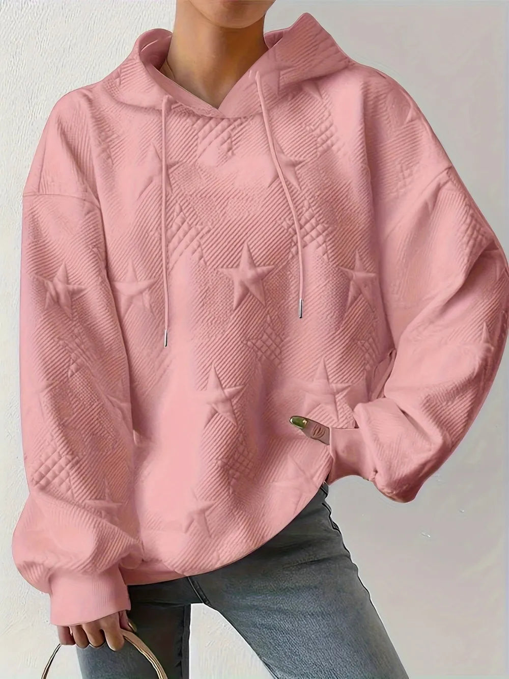 White women’s casual pullover hoodie with star texture and drawstring hood.








