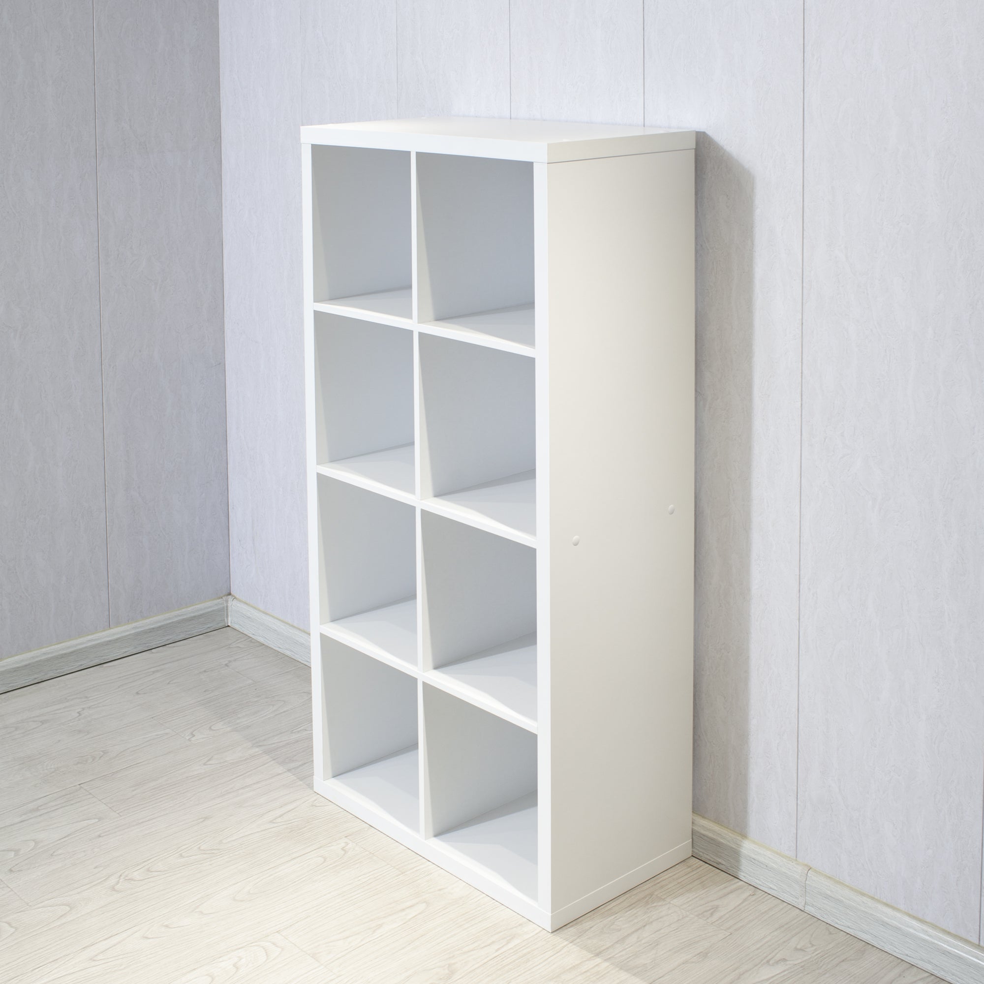 White 8-cube organizer shelf used in a modern home office
