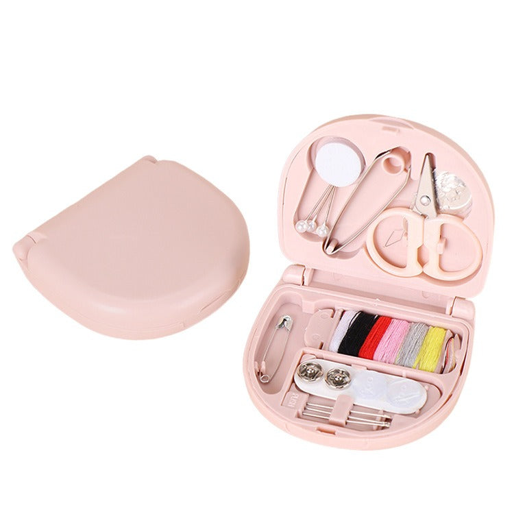 Compact mini needle box designed for organizing sewing needles, featuring multiple compartments for easy access and storage, perfect for home or travel use
